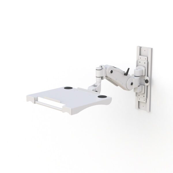Installed in an office setting, the arm retracted and tray folded under desk for compact storage.