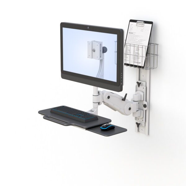 Close-up of VESA monitor mount showing tilt joints, cable channel, and pneumatic height adjustment.