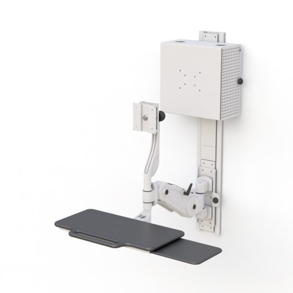 Installed in clinical setting, illustrating space-saving, height-adjustable workstation with organized layout.