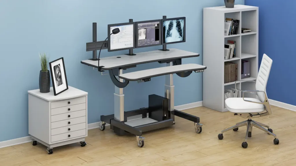 Ergonomic computer workplace ergonomics with adjustable desk and multi-monitor setup