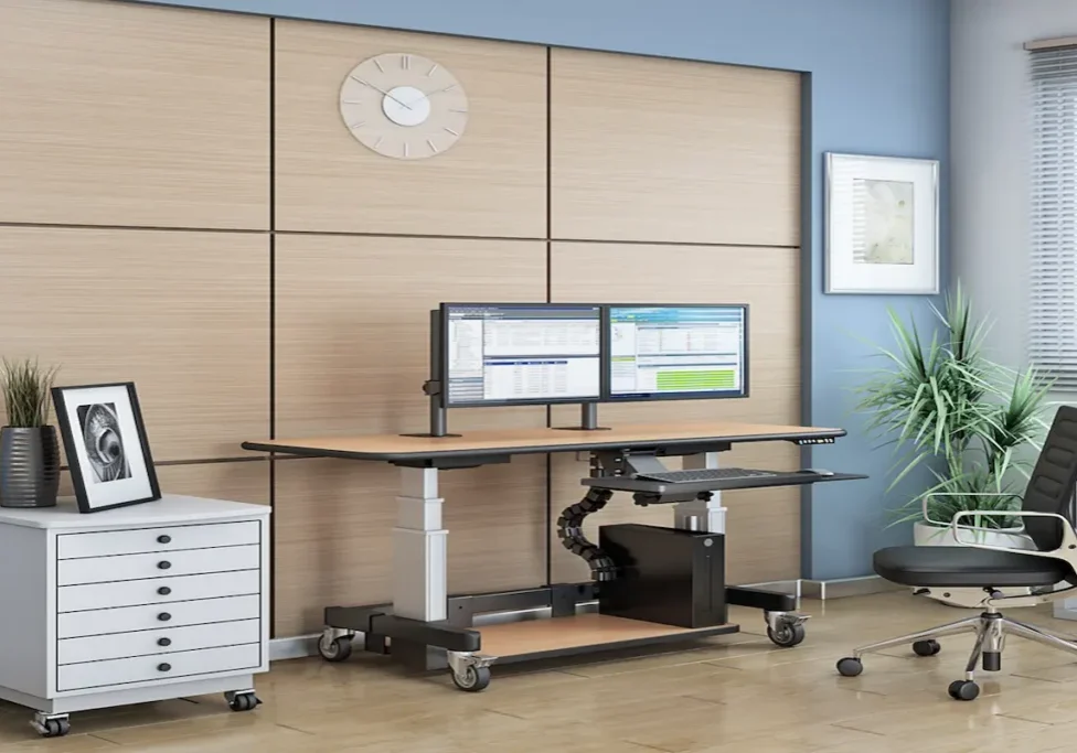 Height adjustable standing desk solutions in a modern office workspace